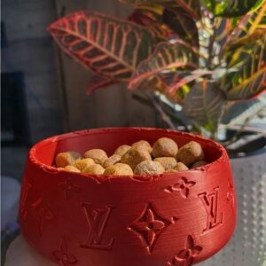 Red Decorative Plastic Bowl with Embossed Monogram Accent